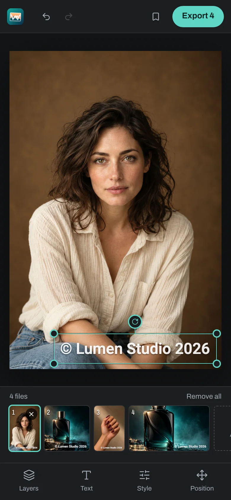 Watermark Ready's editor on a phone, with a portrait and a copyright line